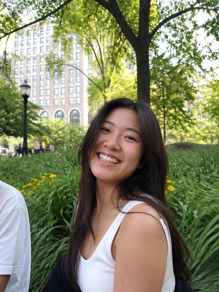 A friend smiling in the park